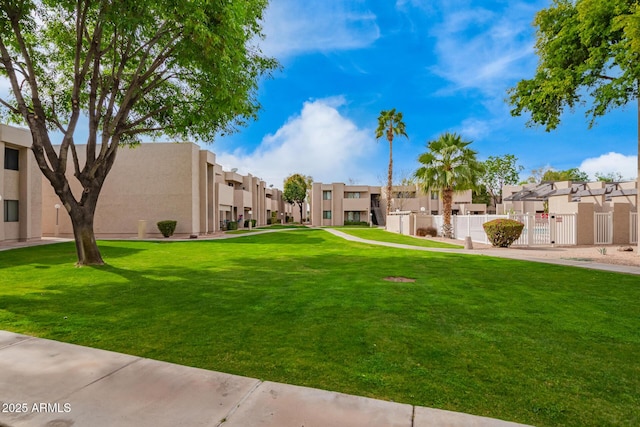 view of community featuring a lawn