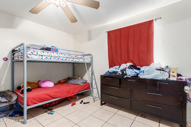 bedroom with light tile patterned flooring and ceiling fan