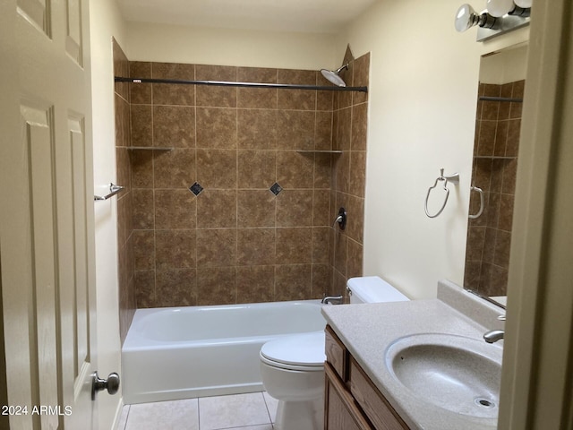 full bathroom featuring tiled shower / bath combo, tile patterned floors, toilet, and vanity