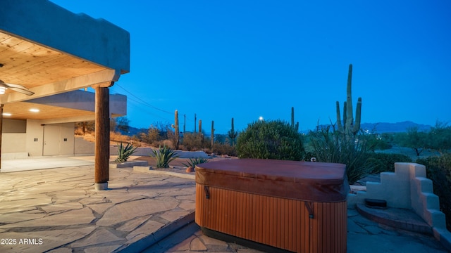 view of patio / terrace featuring a hot tub