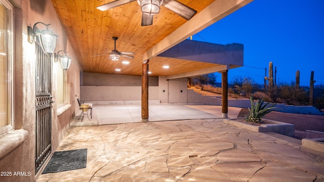 view of patio / terrace featuring ceiling fan