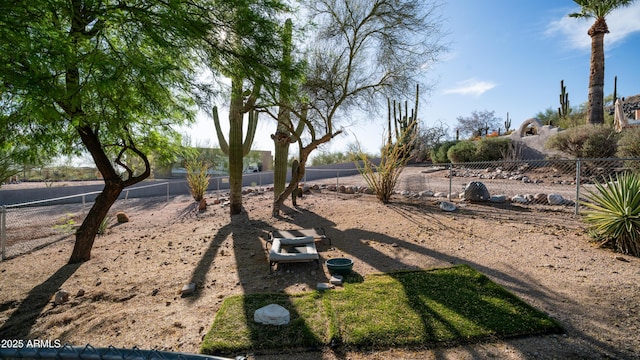 view of yard with fence