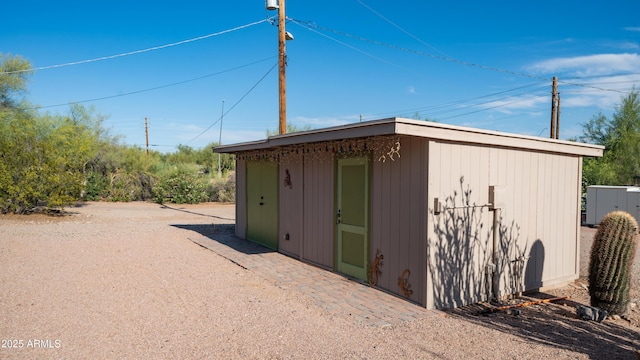 view of outbuilding with an outdoor structure