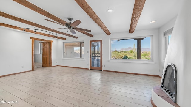 unfurnished living room featuring baseboards, ceiling fan, recessed lighting, and beam ceiling