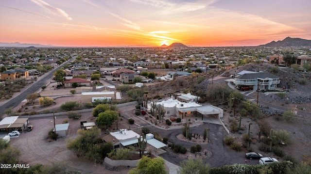 drone / aerial view with a residential view and a mountain view