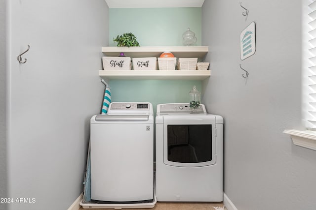 laundry room with washer and dryer