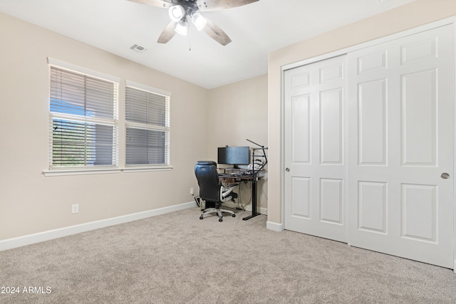 office area with light colored carpet and ceiling fan