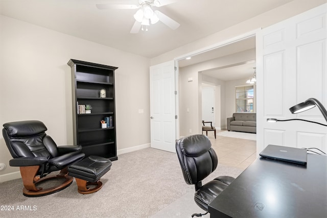 office area with light colored carpet and ceiling fan with notable chandelier