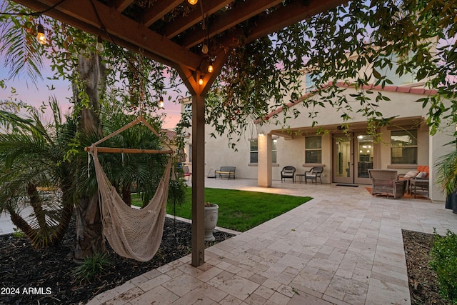 patio terrace at dusk with french doors