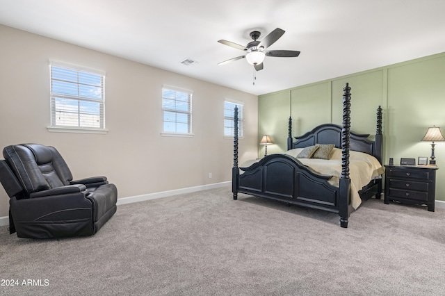 bedroom with light colored carpet and ceiling fan