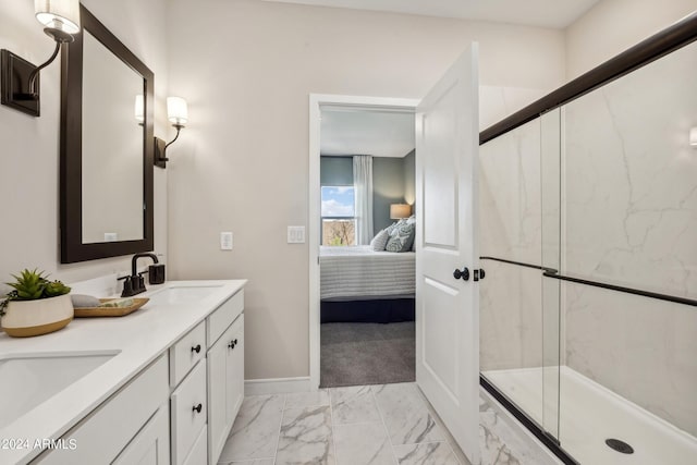 bathroom with an enclosed shower and vanity