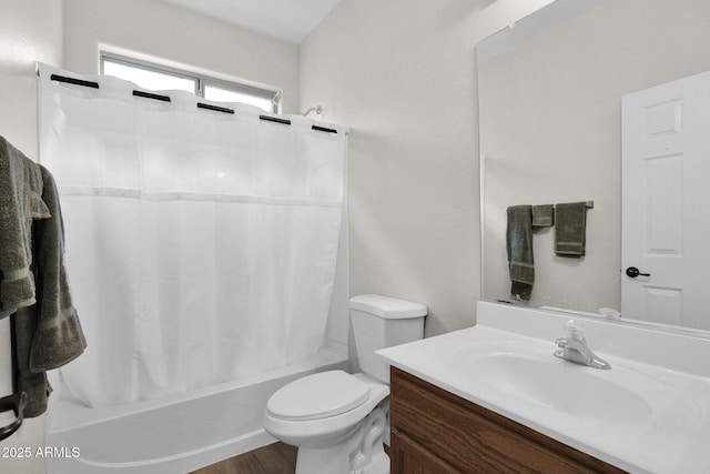 full bathroom with vanity, toilet, hardwood / wood-style floors, and shower / bath combo