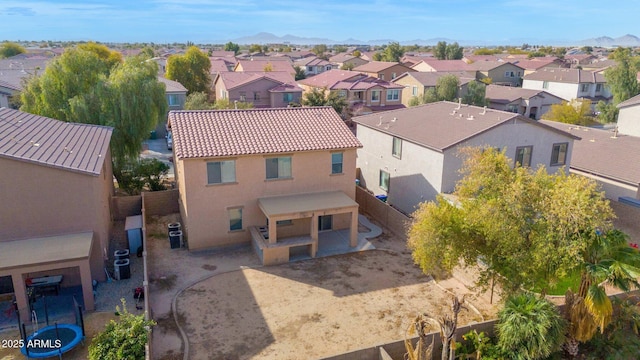 drone / aerial view featuring a mountain view