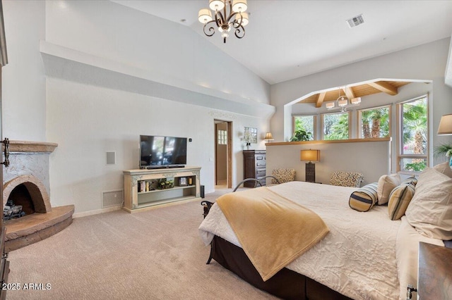 8514 E Country Club Trl, Scottsdale, AZ 85255 - bedroom with carpet, a chandelier, high vaulted ceiling, and a stone fireplace