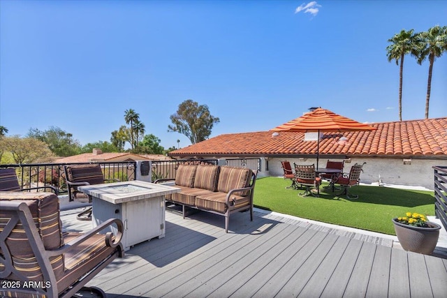 8514 E Country Club Trl, Scottsdale, AZ 85255 - wooden deck featuring a lawn, outdoor dining area, and an outdoor living space with a fire pit