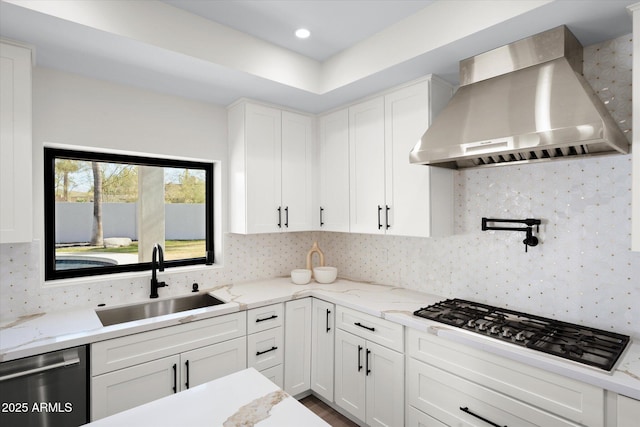 5919 N 45th St, Phoenix, AZ 85018 - kitchen featuring wall chimney exhaust hood, stainless steel appliances, white cabinetry, and backsplash
