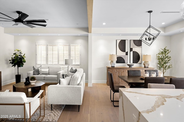 5919 N 45th St, Phoenix, AZ 85018 - living area with ceiling fan, light wood-style floors, a chandelier, and recessed lighting