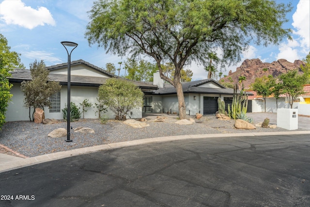 view of front of home with a garage