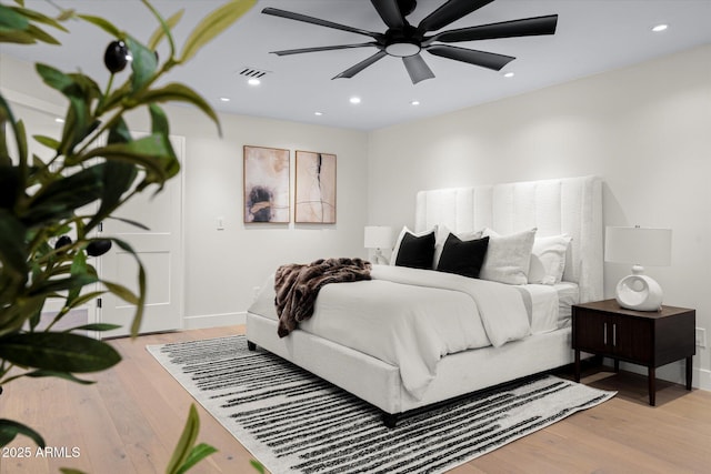 5919 N 45th St, Phoenix, AZ 85018 - bedroom with wood finished floors and recessed lighting