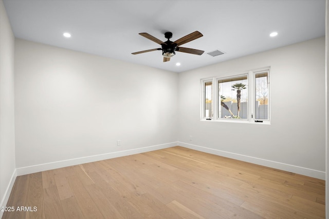 5919 N 45th St, Phoenix, AZ 85018 - spare room with a ceiling fan, light wood-style floors, and recessed lighting