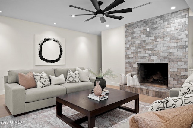 5919 N 45th St, Phoenix, AZ 85018 - living room with ceiling fan, wood finished floors, recessed lighting, and a fireplace
