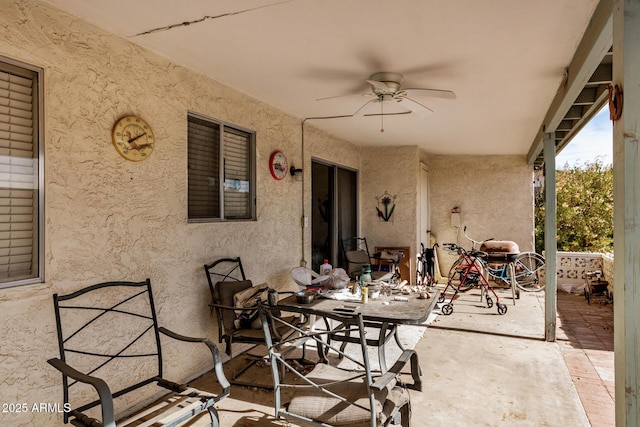 view of patio / terrace featuring ceiling fan