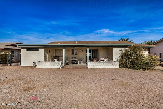 back of house with a patio area