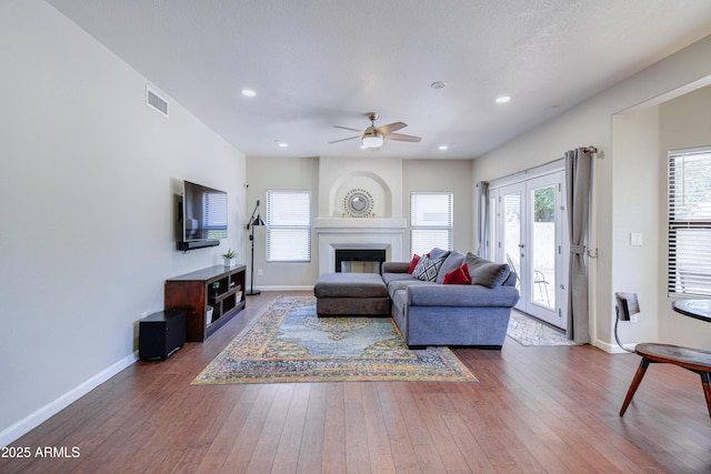 3921 W Jasper Dr, Chandler, AZ 85226 - living room with a ceiling fan, baseboards, hardwood / wood-style floors, and recessed lighting