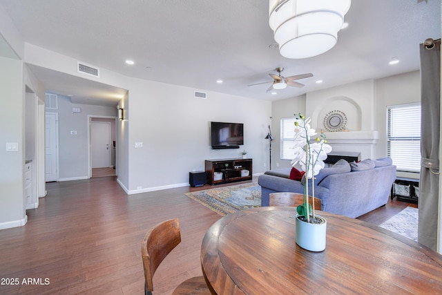 3921 W Jasper Dr, Chandler, AZ 85226 - living area featuring plenty of natural light, wood finished floors, ceiling fan, and recessed lighting