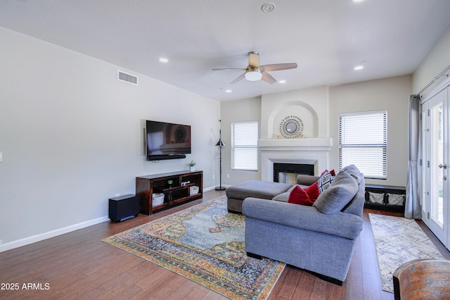 3921 W Jasper Dr, Chandler, AZ 85226 - living area with a ceiling fan, plenty of natural light, a fireplace, baseboards, and recessed lighting