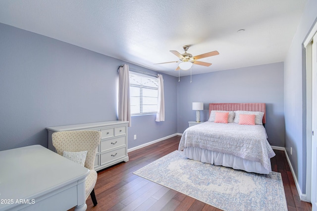 3921 W Jasper Dr, Chandler, AZ 85226 - bedroom with wood finished floors, baseboards, and ceiling fan