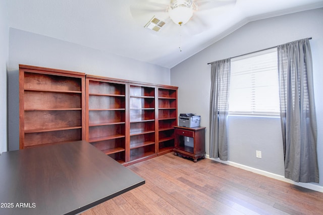 3921 W Jasper Dr, Chandler, AZ 85226 - home office featuring ceiling fan, vaulted ceiling, wood finished floors, and baseboards
