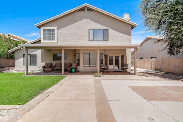 3921 W Jasper Dr, Chandler, AZ 85226 - back of house featuring french doors, outdoor lounge area, stucco siding, a patio area, and a chimney