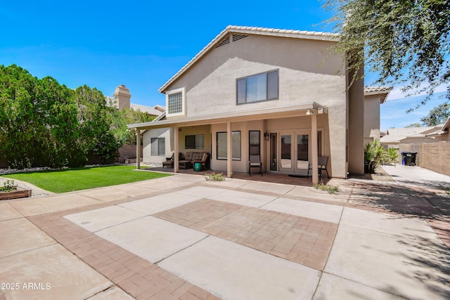 3921 W Jasper Dr, Chandler, AZ 85226 - back of house featuring french doors, stucco siding, and a patio