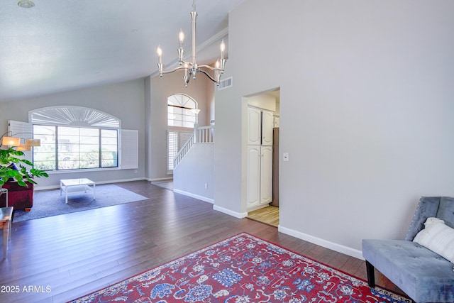 3921 W Jasper Dr, Chandler, AZ 85226 - sitting room featuring stairs, a chandelier, wood finished floors, baseboards, and high vaulted ceiling