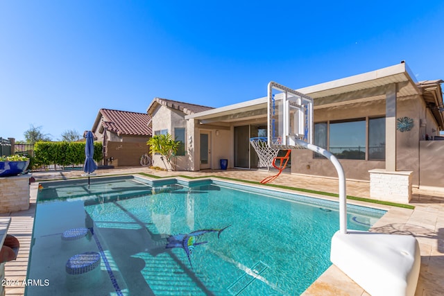 view of swimming pool with a patio, fence, and a fenced in pool