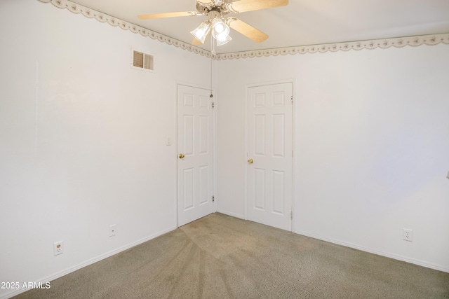 301 Whitton St, Sierra Vista, AZ 85635 - empty room with visible vents, light carpet, baseboards, and ceiling fan