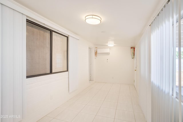 301 Whitton St, Sierra Vista, AZ 85635 - spare room with a wall mounted air conditioner and light tile patterned flooring