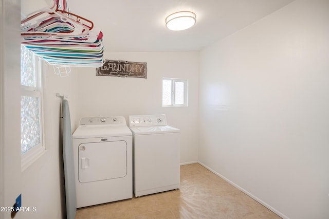301 Whitton St, Sierra Vista, AZ 85635 - clothes washing area featuring light tile patterned flooring, washer and clothes dryer, baseboards, and laundry area