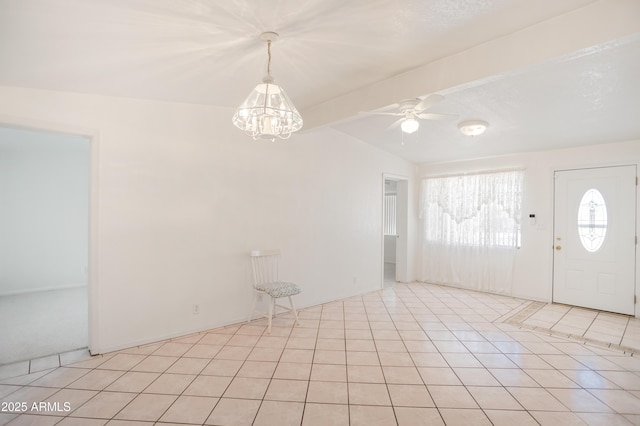 301 Whitton St, Sierra Vista, AZ 85635 - entryway featuring vaulted ceiling, light tile patterned flooring, and ceiling fan with notable chandelier