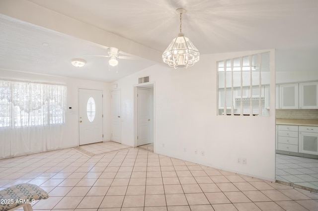 301 Whitton St, Sierra Vista, AZ 85635 - entrance foyer featuring vaulted ceiling, ceiling fan with notable chandelier, visible vents, and light tile patterned floors