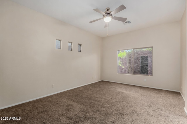 16846 N 49th Way, Scottsdale, AZ 85254 - empty room featuring carpet floors, a ceiling fan, and baseboards