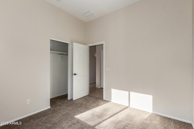 16846 N 49th Way, Scottsdale, AZ 85254 - unfurnished bedroom with carpet floors, baseboards, and a closet