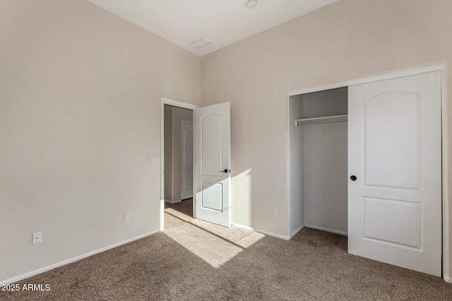 16846 N 49th Way, Scottsdale, AZ 85254 - unfurnished bedroom featuring carpet flooring, a closet, and baseboards