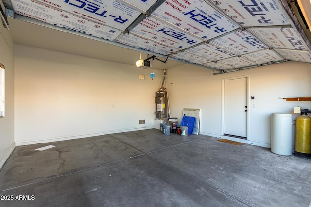 16846 N 49th Way, Scottsdale, AZ 85254 - garage with a garage door opener, water heater, and baseboards