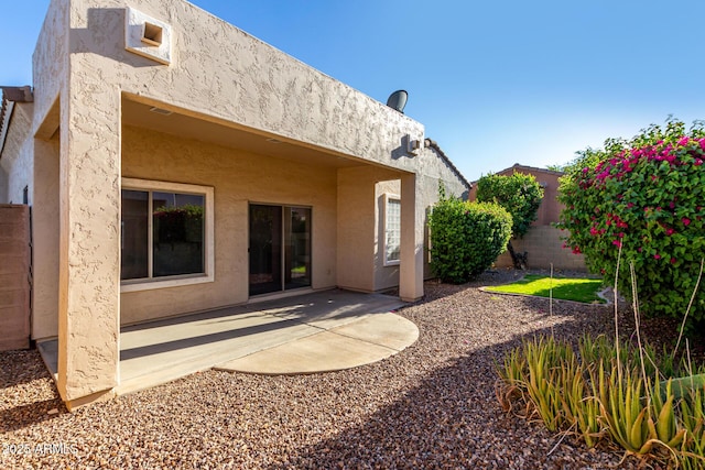 16846 N 49th Way, Scottsdale, AZ 85254 - rear view of house with stucco siding, a patio, and a fenced backyard