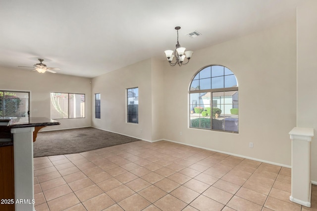 16846 N 49th Way, Scottsdale, AZ 85254 - unfurnished living room featuring light tile patterned flooring, a chandelier, light carpet, a ceiling fan, and baseboards