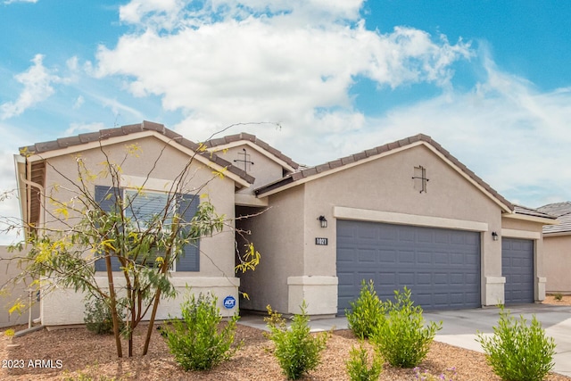 view of front of home with a garage