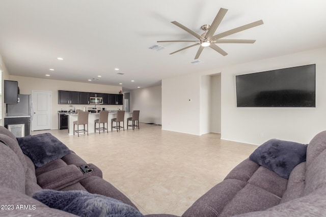 living room with ceiling fan