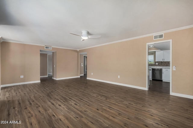 unfurnished living room with dark wood-type flooring, ornamental molding, and ceiling fan